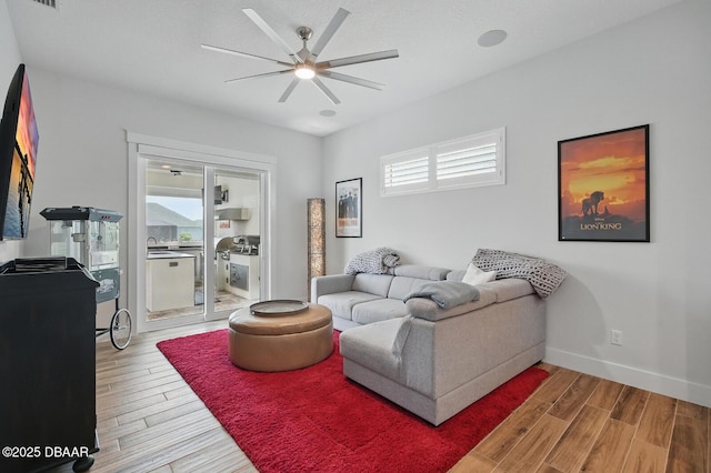 3236 Modena Way, New Smyrna Beach, FL 32168 - living room with wood finished floors and a ceiling fan