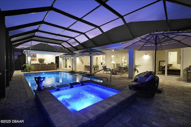 3236 Modena Way, New Smyrna Beach, FL 32168 - swimming pool featuring an in-ground hot tub, a patio area, ceiling fan, and a lanai