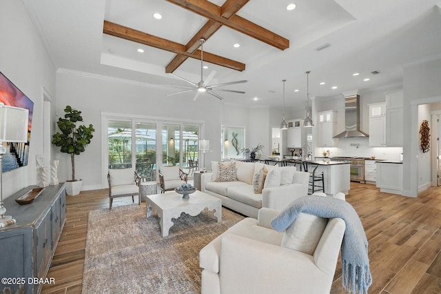 3236 Modena Way, New Smyrna Beach, FL 32168 - living room featuring coffered ceiling, recessed lighting, beamed ceiling, a ceiling fan, and light wood finished floors