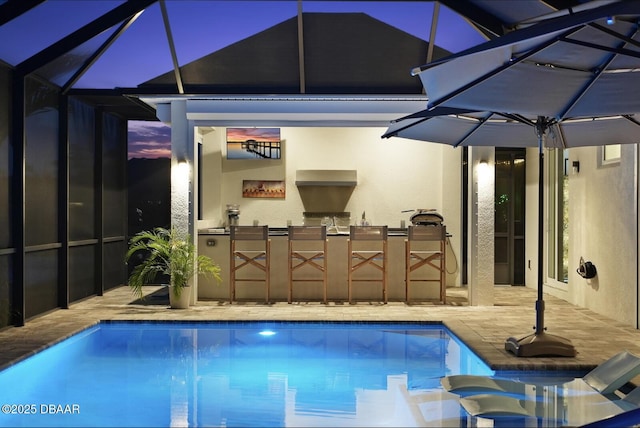 3236 Modena Way, New Smyrna Beach, FL 32168 - swimming pool with area for grilling, glass enclosure, and a patio area