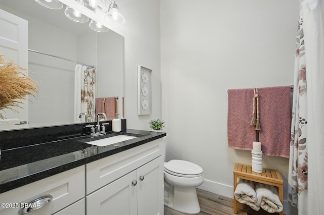 3236 Modena Way, New Smyrna Beach, FL 32168 - bathroom featuring vanity, wood finished floors, and a shower with shower curtain