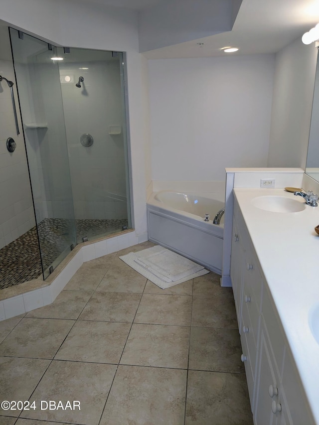 bathroom featuring vanity, separate shower and tub, and tile patterned flooring