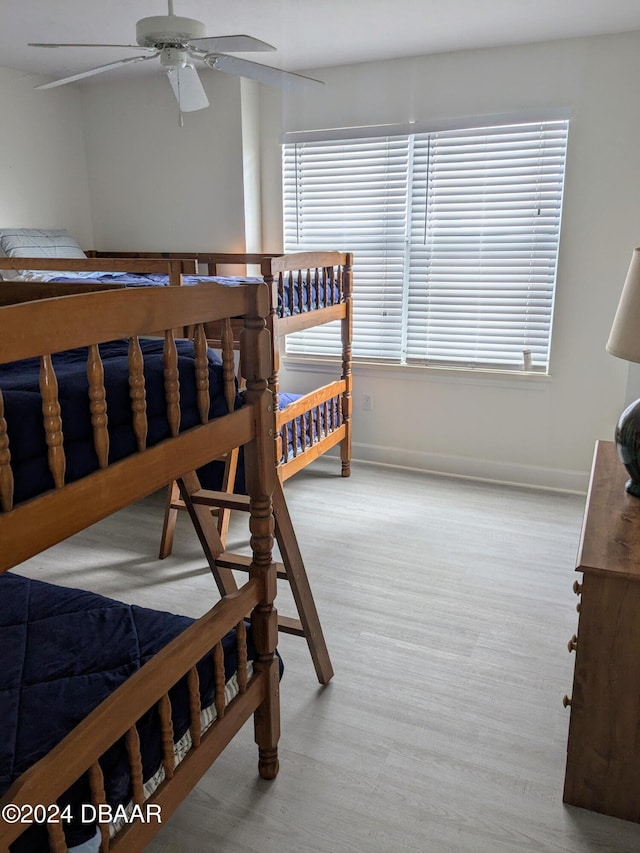 3311 S Atlantic Ave Unit 604, Daytona Beach, FL 32118 - bedroom featuring wood finished floors and baseboards