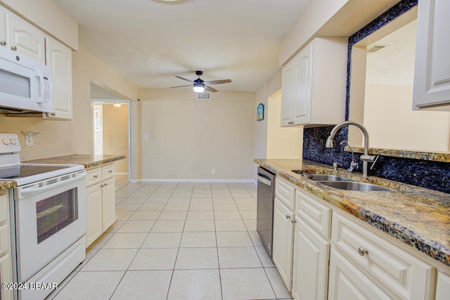 kitchen with white cabinetry, sink, ceiling fan, white appliances, and light tile patterned floors