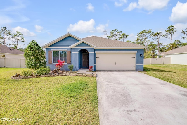 ranch-style home with a front lawn, driveway, an attached garage, and fence