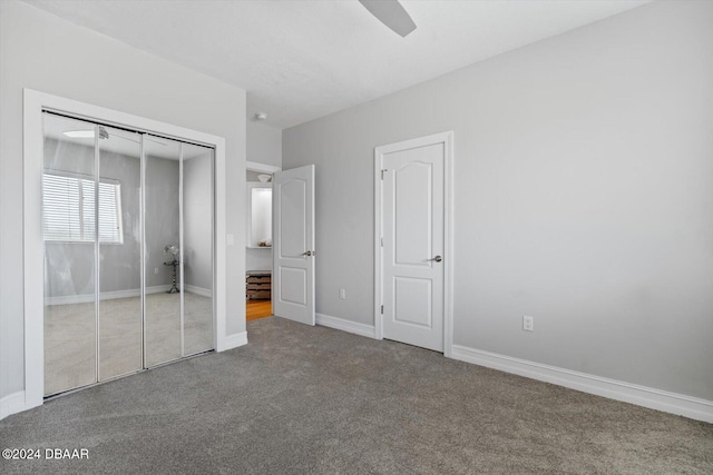 unfurnished bedroom with a closet, ceiling fan, and carpet flooring