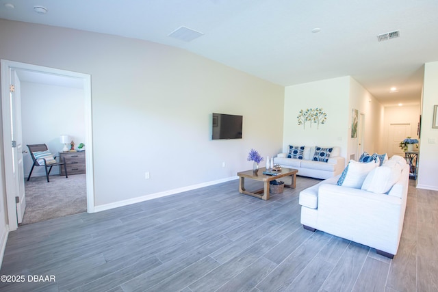3963 Willowbrook Dr, Edgewater, FL 32141 - living room featuring wood finished floors, baseboards, and lofted ceiling