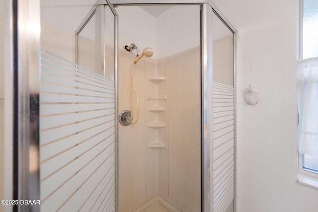 bathroom with an enclosed shower