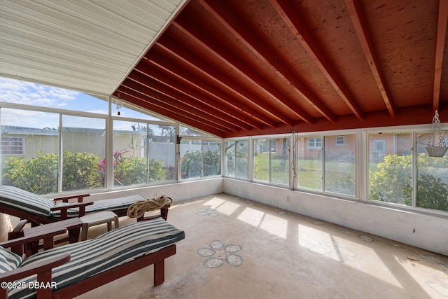 sunroom with lofted ceiling