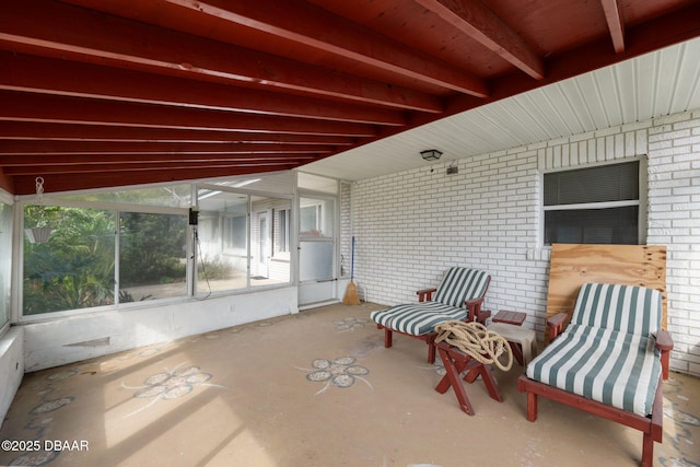 view of patio / terrace with a lanai