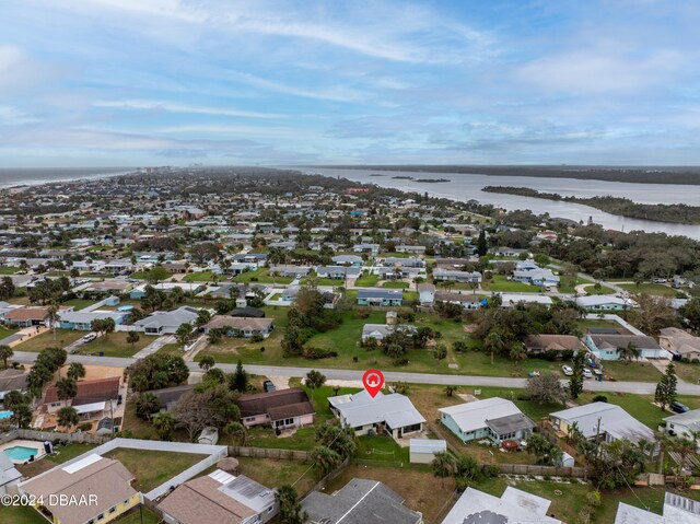 drone / aerial view featuring a water view