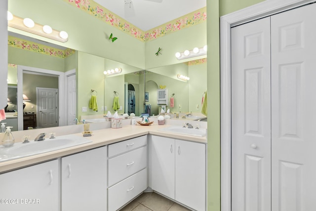 bathroom with vanity and tile patterned floors