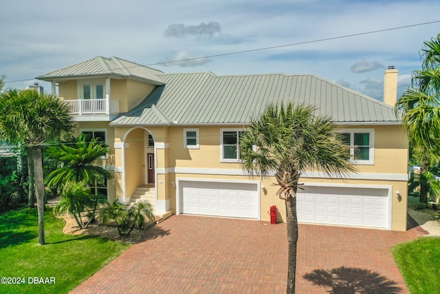 view of front of property featuring a garage