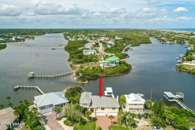 drone / aerial view featuring a water view