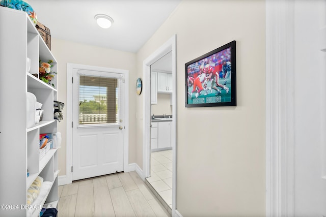 doorway featuring sink