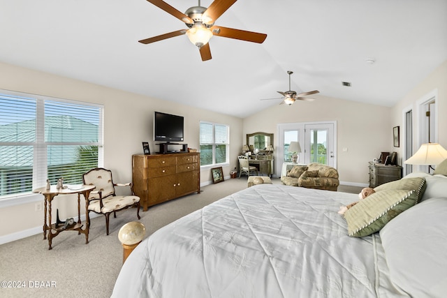 bedroom featuring ceiling fan, light colored carpet, french doors, and lofted ceiling