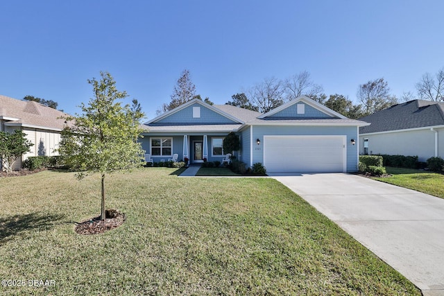 view of front of house with a garage and a front yard