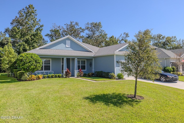 1321 Tullamore Blvd, Ormond Beach, FL 32174 - view of front of house featuring an attached garage, a front lawn, and concrete driveway