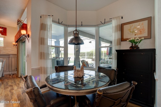 3102 N Springwater Ct N, Port Orange, FL 32128 - dining space featuring wood finished floors
