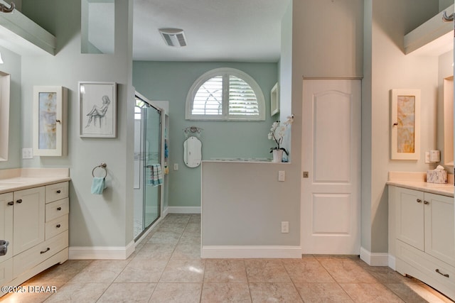 3102 N Springwater Ct N, Port Orange, FL 32128 - bathroom featuring vanity, a stall shower, and tile patterned floors
