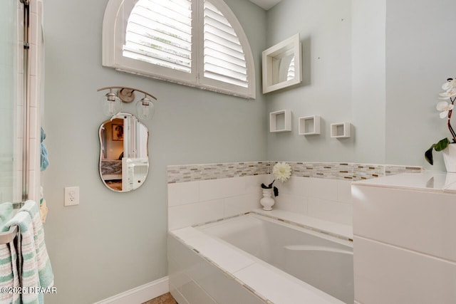 3102 N Springwater Ct N, Port Orange, FL 32128 - bathroom with a bath and baseboards
