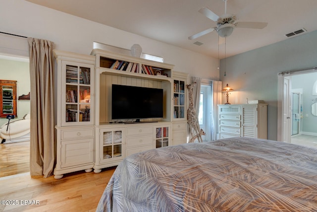 3102 N Springwater Ct N, Port Orange, FL 32128 - bedroom featuring light wood-style floors and a ceiling fan
