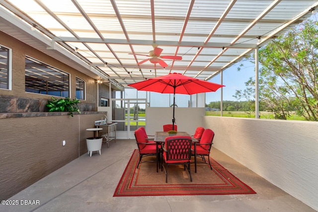 3102 N Springwater Ct N, Port Orange, FL 32128 - view of patio / terrace with outdoor dining space, ceiling fan, and a pergola