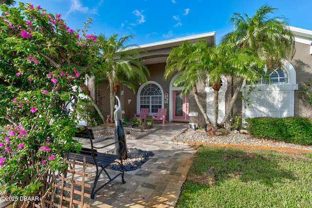 3102 N Springwater Ct N, Port Orange, FL 32128 - property entrance with stucco siding