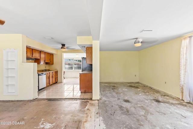 kitchen with visible vents, brown cabinetry, dishwasher, ceiling fan, and open floor plan