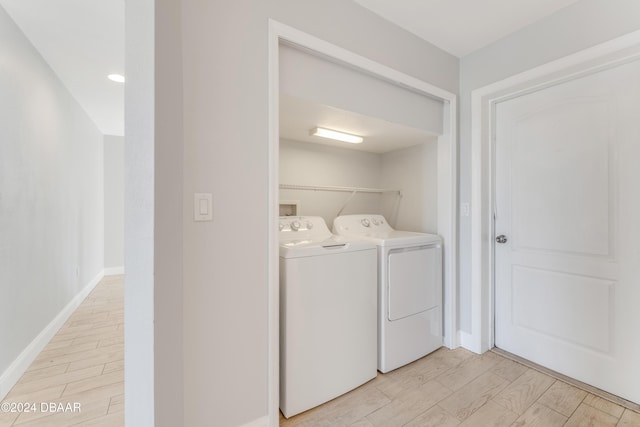 laundry area with washing machine and dryer