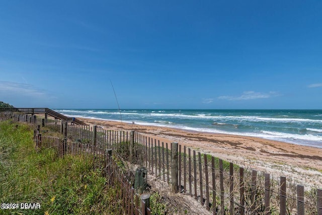 property view of water featuring a beach view