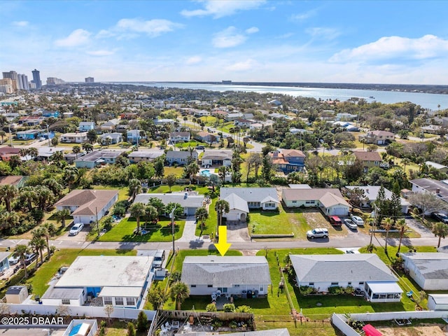 drone / aerial view with a water view