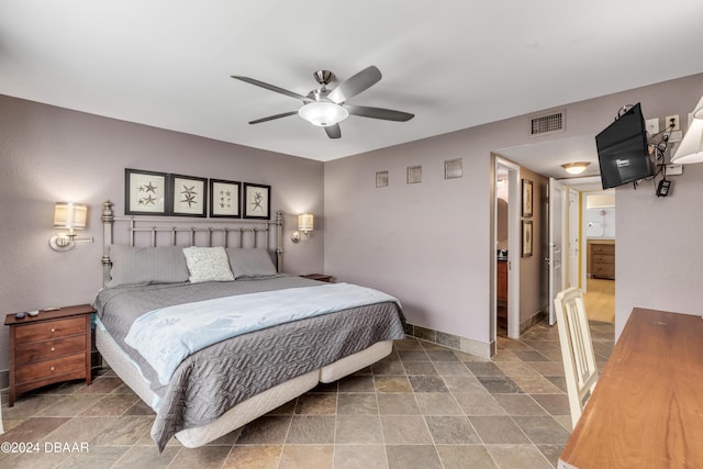 bedroom with connected bathroom and ceiling fan