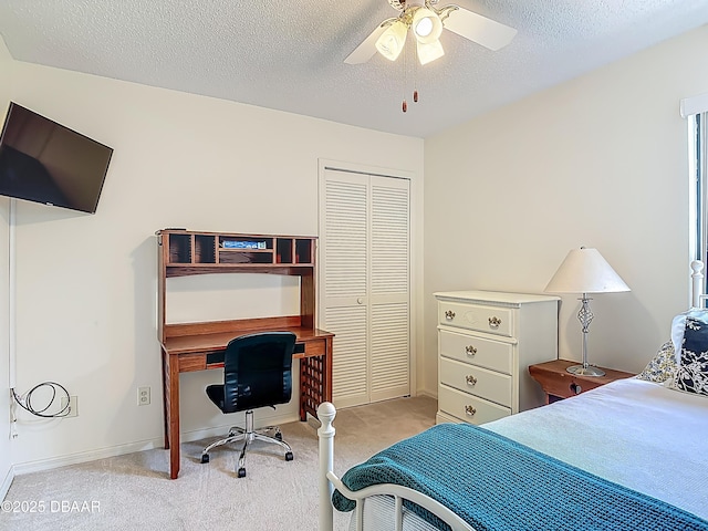 907 Silverleaf Pl, Port Orange, FL 32127 - bedroom featuring light colored carpet, a closet, a textured ceiling, and ceiling fan