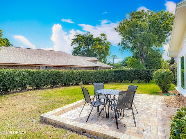 907 Silverleaf Pl, Port Orange, FL 32127 - view of patio / terrace featuring a fenced backyard and outdoor dining area