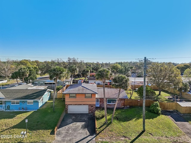 birds eye view of property with a residential view