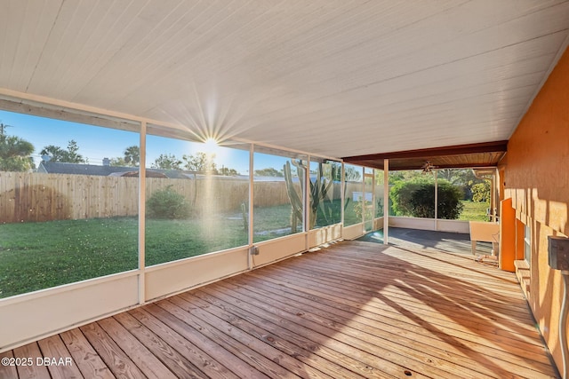 unfurnished sunroom with wood ceiling