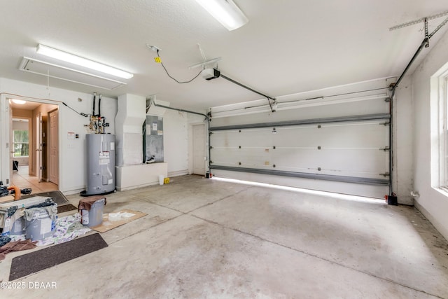 garage with water heater, a garage door opener, and heating unit