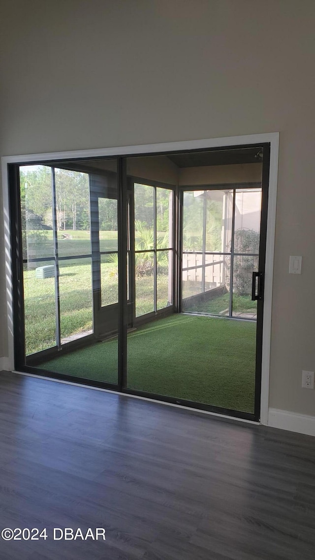 interior space with hardwood / wood-style flooring and a healthy amount of sunlight