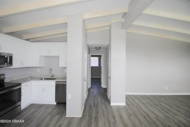 kitchen featuring white cabinetry, sink, stainless steel appliances, vaulted ceiling with beams, and dark hardwood / wood-style flooring