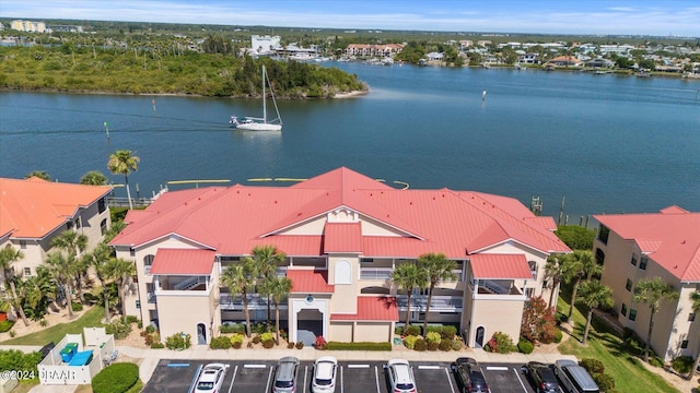 birds eye view of property featuring a water view