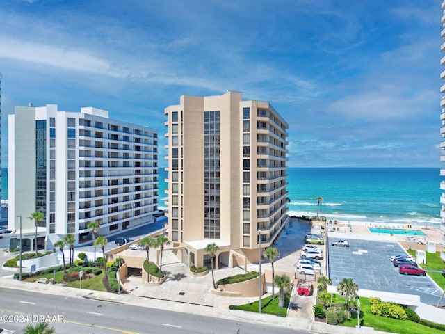 view of building exterior featuring a water view