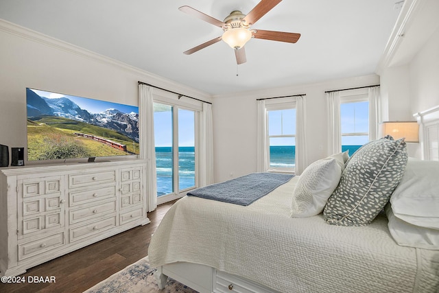 bedroom featuring ceiling fan, dark hardwood / wood-style flooring, crown molding, access to outside, and a water view