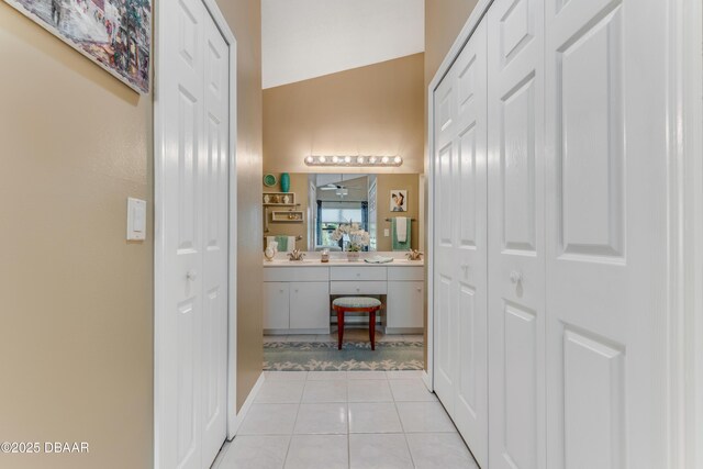916 Ashmeade Ct, Port Orange, FL 32127 - bathroom featuring a closet, tile patterned flooring, and vanity