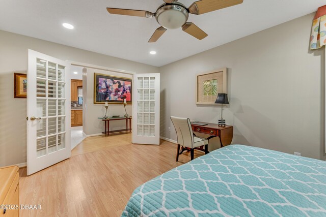 916 Ashmeade Ct, Port Orange, FL 32127 - bedroom with light wood-type flooring, french doors, recessed lighting, and a ceiling fan