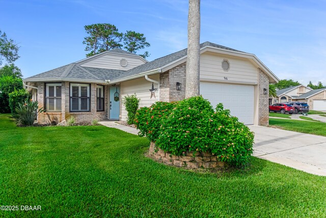 916 Ashmeade Ct, Port Orange, FL 32127 - view of front of property featuring brick siding, a garage, and a front yard