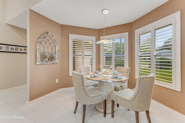 916 Ashmeade Ct, Port Orange, FL 32127 - dining area featuring light tile patterned floors