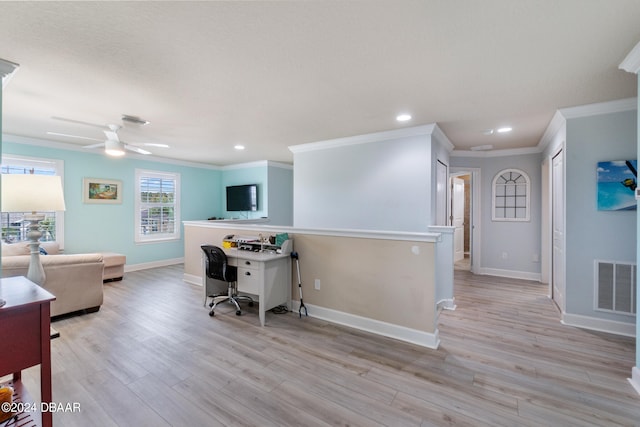 home office featuring ceiling fan, light hardwood / wood-style floors, and crown molding