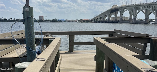 dock area featuring a water view