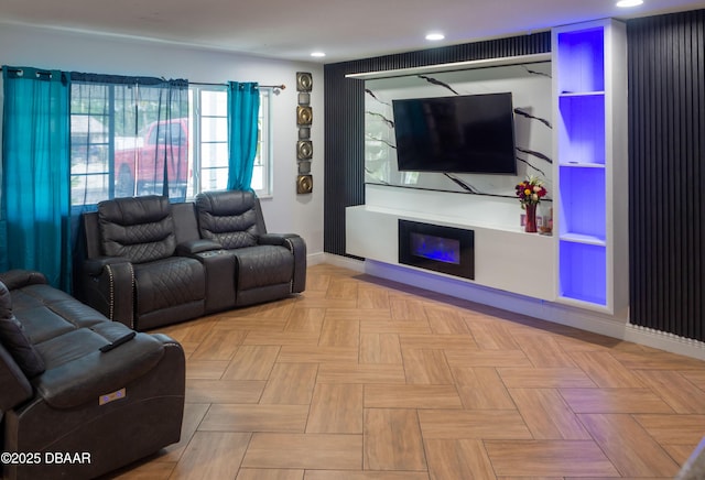 1325 Laurel Dr, Daytona Beach, FL 32117 - living area with baseboards, recessed lighting, and a glass covered fireplace